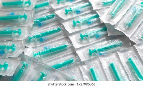 Medical Waste, Therapeutic Syringes In Packaging A Bunch Of Unused, Packaged Syringes.