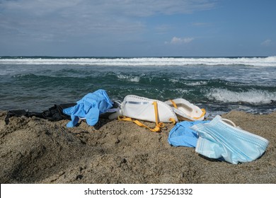 Medical Waste,Virus Mask And Plastic Gloves Garbage On Sea Coast,coronavirus Covid19 Pollution 