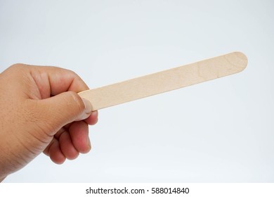 Medical Wooden Tongue Depressor On White Blackboard