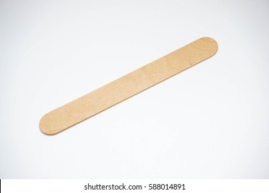 Medical Wooden Tongue Depressor On White Blackboard