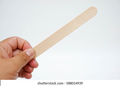 Medical Wooden Tongue Depressor On White Blackboard