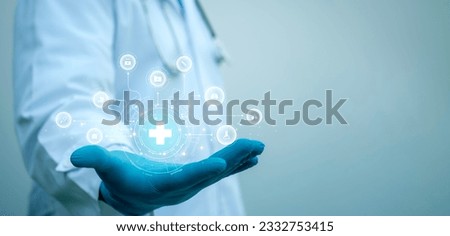 A medical worker hold technology medical cross shape and healthcare, Virus pandemic develop people awareness and spread attention on their healthcare in global.