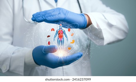 Medical worker holding hologram of a human body with human organs in concept of health. Medical future technology and innovative concept.Elevate healthcare with AI technology services.