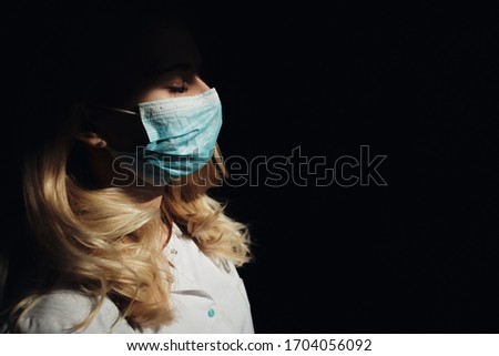 Medical worker with a mask on his face