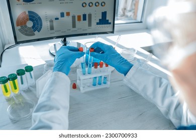 A medical worker performing tests on instruments in a chemical laboratory. a scientist conducting research in the laboratory to identify new treatments for infectious diseases. - Powered by Shutterstock