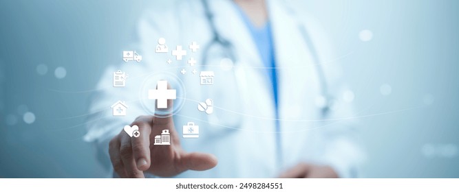 A medical worker using virtual with health care icons, medical technology background, health insurance business.Health Insurance, telemedicine, virtual hospital, family medicine concept. - Powered by Shutterstock