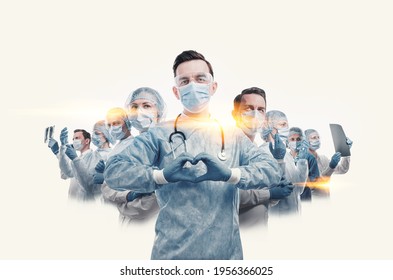 Medical Workers Heroes. A Nurse In The Foreground In A Mask And Uniform Holds Her Hands In The Shape Of A Heart. Go To A Lot Of Medical Professionals.