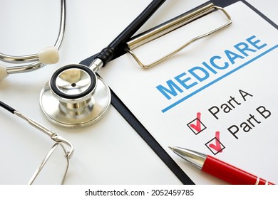 Medicare application form with marked plan A and B. - Shutterstock ID 2052459785