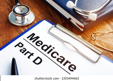 Medicare Part D Documents With Clipboard On A Desk.