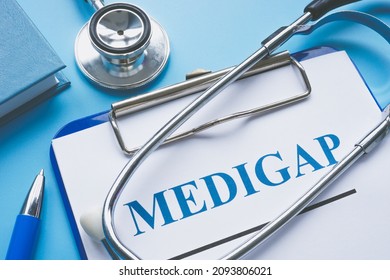 Medicare Supplement Insurance Medigap Application And Stethoscope.