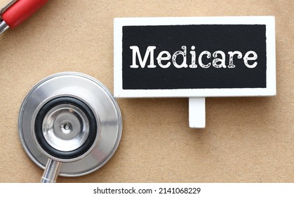 Medicare Word On A Small Chalk Board.