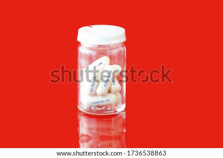 Medication antiviral capsule pills in a medicine bottle for treatment infection to prevention and treatment for coronavirus infection COVID-19, drug nCCoV 2019. Pandemic infectious concept