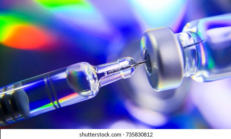 Medication drug needle syringe drug,medical Vaccine vial hypodermic injection treatment disease care in hospital and prevention illness. color full background selective focus.