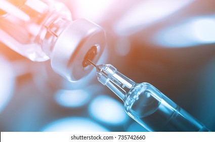 Medication drug needle syringe drug, medical Vaccine vial hypodermic injection treatment disease care in hospital and prevention illness. selective focus.