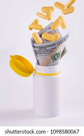 Medication falling into a bottle through money funnel. 