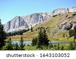 Medicine Bow National Forest in Wyoming, United States. Medicine Bow Peak as seen from Lewis Lake. Located off the Snowy Range Scenic Byway, managed by the Laramie Ranger District.