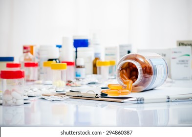 medicine capsules laid out on a folder