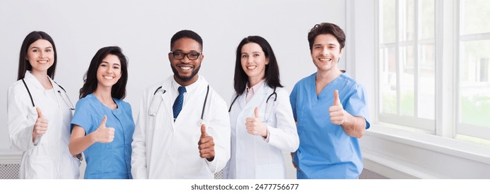 Medicine Concept. Happy Doctors Showing Thumbs Up At Hospital - Powered by Shutterstock