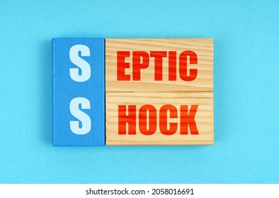 Medicine Concept. On A Blue Background, Wooden Plaques With The Inscription - Septic Shock