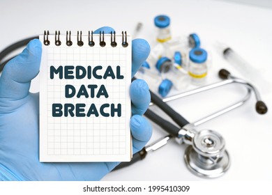 Medicine Concept. There Is A Stethoscope On The Table, The Doctor Holds A Notebook In His Hand With The Inscription - Medical Data Breach