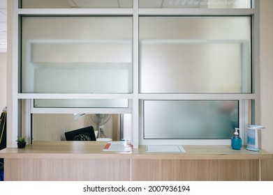 Medicine Dispensary Room With Thick Window Opening And Wooden Counter In Hospital