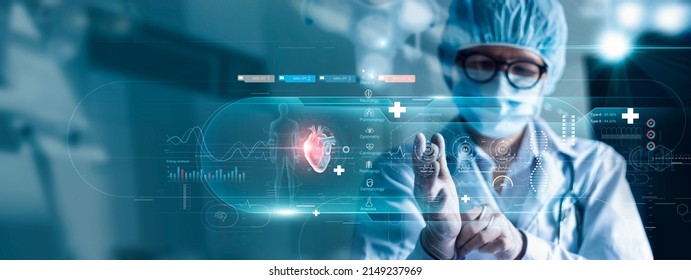Medicine doctor cardiologist diagnose and examine patient virtual heart with intelligence software of innovative medical technology on modern interface network connection. Medical healthcare. - Shutterstock ID 2149237969