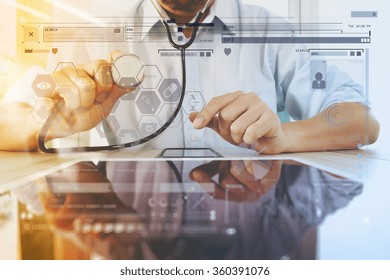 Medicine Doctor Hand Holding Stethoscope With Modern Computer Interface As Medical Network Concept