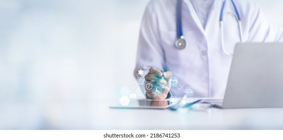 Medicine doctor hand working with digital tablet modern computer interface Doctor is showing medical analytics data, Medical technology Healthcare concept - Shutterstock ID 2186741253