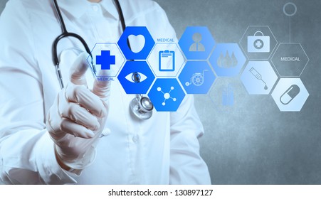 Medicine doctor hand working with modern computer interface - Shutterstock ID 130897127