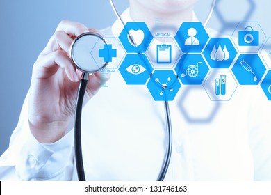 Medicine doctor hand working with modern computer interface as concept - Powered by Shutterstock