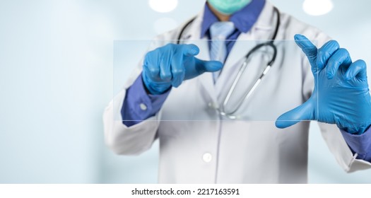 Medicine doctor holding blank virtual screen and pointing for analysis and diagnosis.Research and Inhibition of disease outbreaks.Health care concept. - Shutterstock ID 2217163591