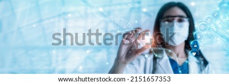 Medicine doctor holding capsule pill research and diagnosis of effective to patient and icon healthcare on hologram interface. Digital health care and medical network. DNA. science and health. 