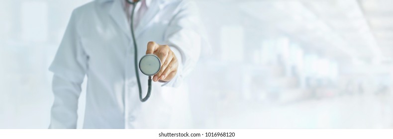Medicine doctor holding stethoscope in hand on hospital background, medical and patient concept, blank text