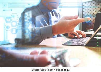 Medicine doctor meeting with team working with modern digital tablet dock smart keyboard,computer interface as medical network concept,sun effect                                - Shutterstock ID 548353513