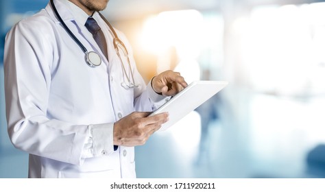 Medicine doctor or pharmacist use tablet or mobile phone.Health care and medical or Health Insurance concept. - Shutterstock ID 1711920211