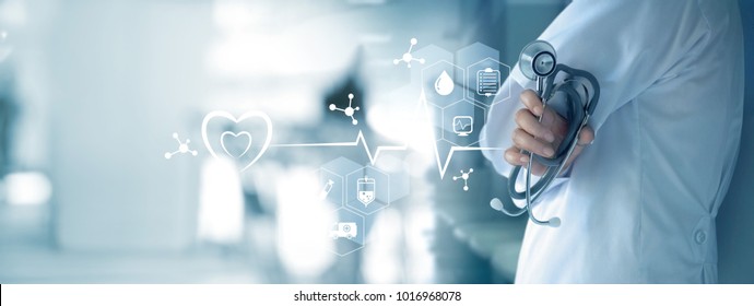 Medicine doctor with stethoscope in hand and icon medical network connection on  virtual screen interface. Modern medical technology and innovation concept