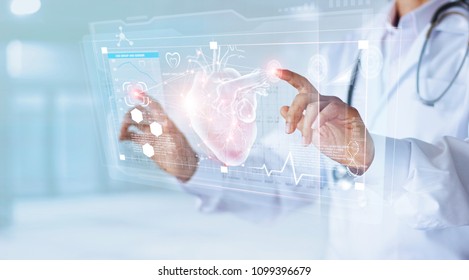 Medicine doctor and stethoscope touching icon heart and diagnostics analysis medical on modern virtual screen interface network connection. Medical technology diagnostics of heart  concept - Shutterstock ID 1099396679
