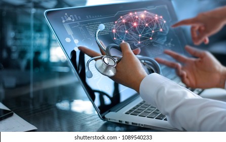 Medicine doctor team meeting and analysis. Diagnose checking brain testing result with modern virtual screen interface on laptop with stethoscope in hand, Medical technology network connection concept - Shutterstock ID 1089540233