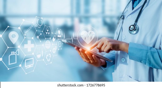 Medicine doctor touching tablet with  digital healthcare and network connection and hologram modern virtual screen interface icons, Medical technology and futuristic concept. - Shutterstock ID 1726778695