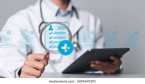 Medicine doctor use tablet to review patient medical records on virtual screens for digital healthcare. Review medical reports carefully and diagnose illnesses for an effective treatment plan. - Powered by Shutterstock