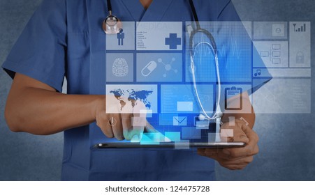 Medicine Doctor Working With Modern Tablet Computer And Virtual Interface