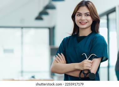 Medicine female doctor with stethoscope standing in hospital.Health care and medical concept. - Shutterstock ID 2255917179