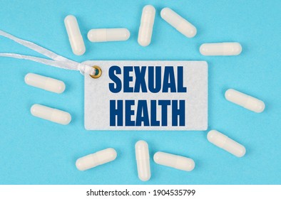 Medicine And Health Concept. There Is A Label On The Table Among The Pills That Says - SEXUAL HEALTH