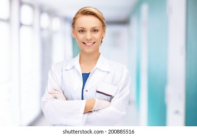 medicine and healthcare concept - attractive female doctor in hospital - Powered by Shutterstock