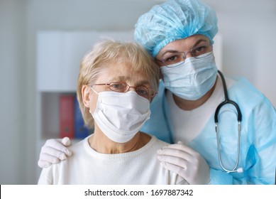 Medicine And Healthcare Concept. Doctor  And Elderly Woman Patient. Coronavirus. Covid-19