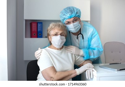 Medicine and healthcare concept. Doctor  and elderly woman patient. Coronavirus. Covid-19 - Powered by Shutterstock