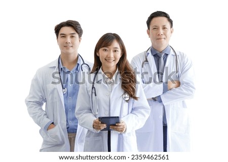 Medicine and healthcare concept : Group of happy and cheerful asian doctors Line up, Male and Female are smiling in lobby of hospital. 