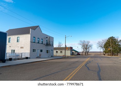 MEDICINE LAKE, MONTANA - DECEMBER 4, 2017:  Looking Down Main Street Of The Small Quiet Town Of Medicine Lake In Northeast Rural Montana.