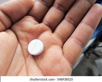 Medicine pill  in hand