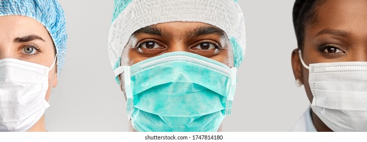 medicine, profession and healthcare concept - close up of doctor's faces in masks over grey background - Powered by Shutterstock